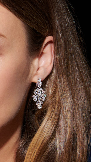 Chandelier drop earrings for womem featuring a cluster of pears and marquise-cut stones. 