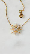 Star design gold necklace for women.