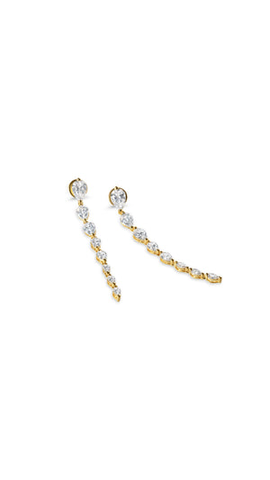 Drop earrings featuring 18K gold vermeil and sparkling pear-shaped gemstones. Statement earrings for a dramatic look.