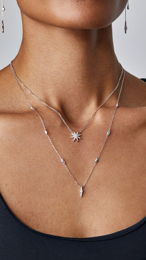 Sterling silver layered necklace for women featuring a star design.