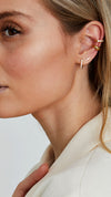 Minimalist gold ear stack with dainty hoops and cuffs