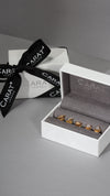 5 studs to stack gift set for women in ribbon wrapped box.