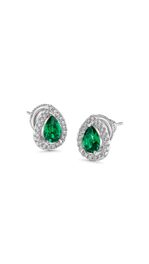 Classic sterling silver studs featuring an exquisite halo border setting in 1.25ct. eq. emerald green pear cut centre stone.