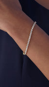 A delicate tennis bracelet for women crafted in sterling silver with a yellow gold vermeil finish for ultimate sparkle.