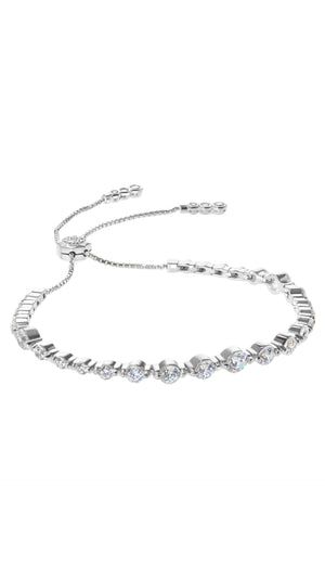 Sterling silver tennis bracelet for women featuring varying sizes of Round Brilliant cut stones, Grace is a modern take on the traditional tennis bracelet. 