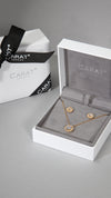 Gwen gold necklace and earrings gift set for women in ribbon wrapped box.