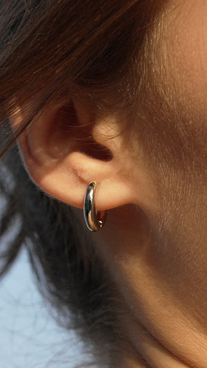 Lightweight and easy-to-wear hoops, featuring a secure click closure.