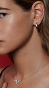 white gold plated sterling silver hoops in an ear stack with dixie sterling silver lab-grown diamond studs