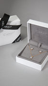 9k solid gold necklace and earring gift set for women in wrapped bow box.