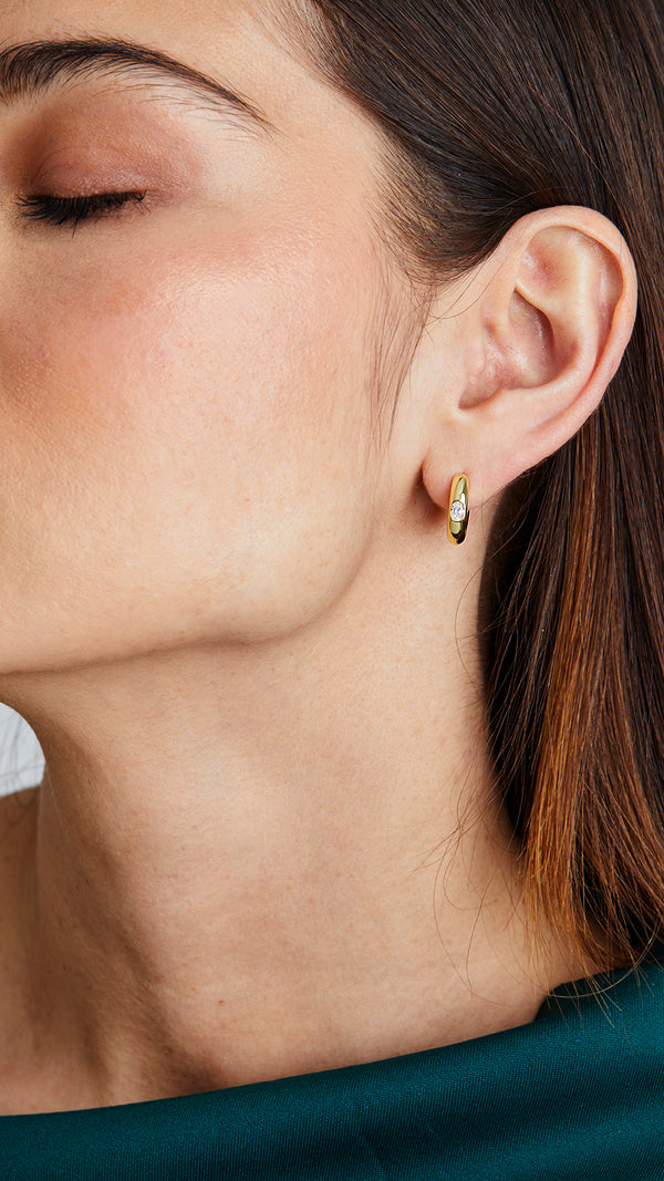 Polished gold vermeil hoop earrings for women with an oval gemstone centre. 