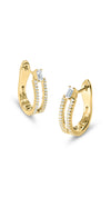 Gold hoops for women embellished with a baguette cut centre stone and micro setting details.