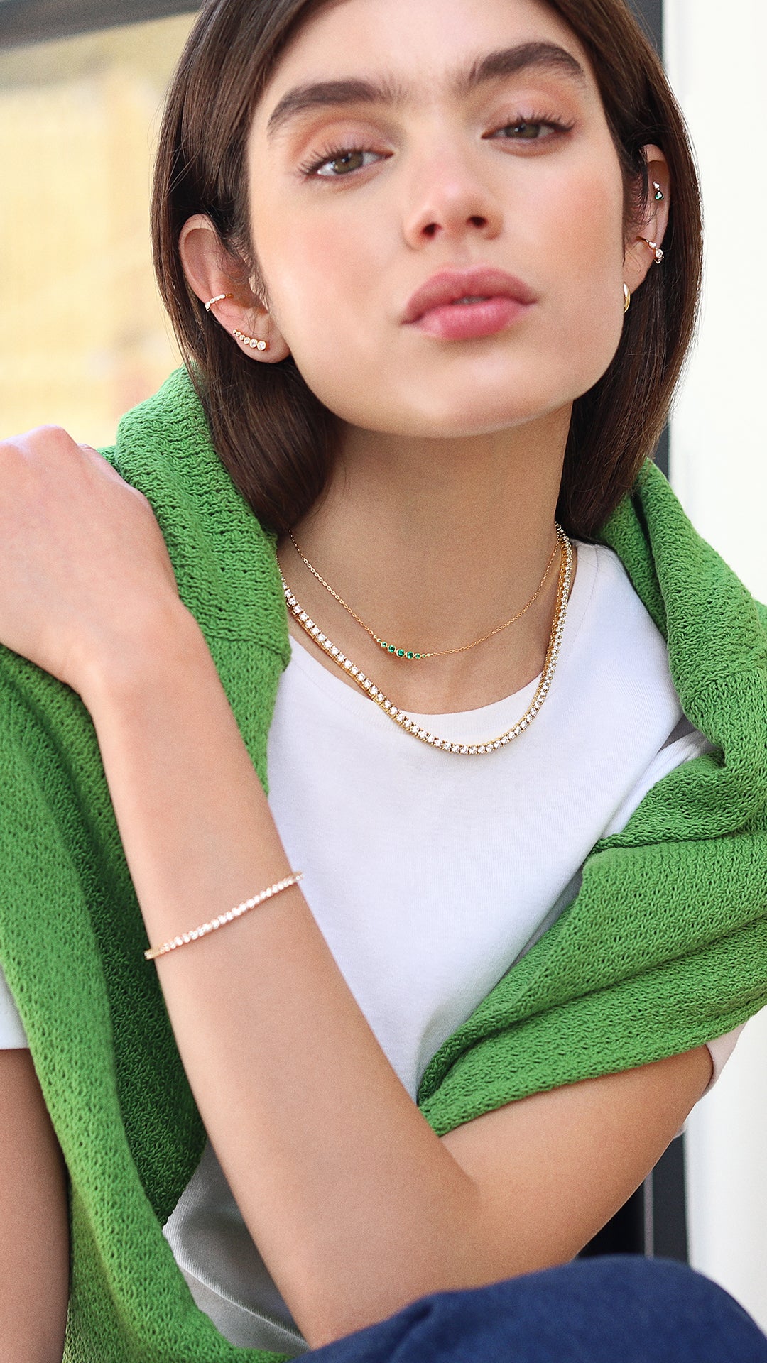 Women’s tennis jewellery, layered gold necklaces for spring summer style