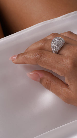 The Reese pave dome ring, crafted from sterling silver with a white gold finish, is a classic statement piece perfect for any jewellery collection