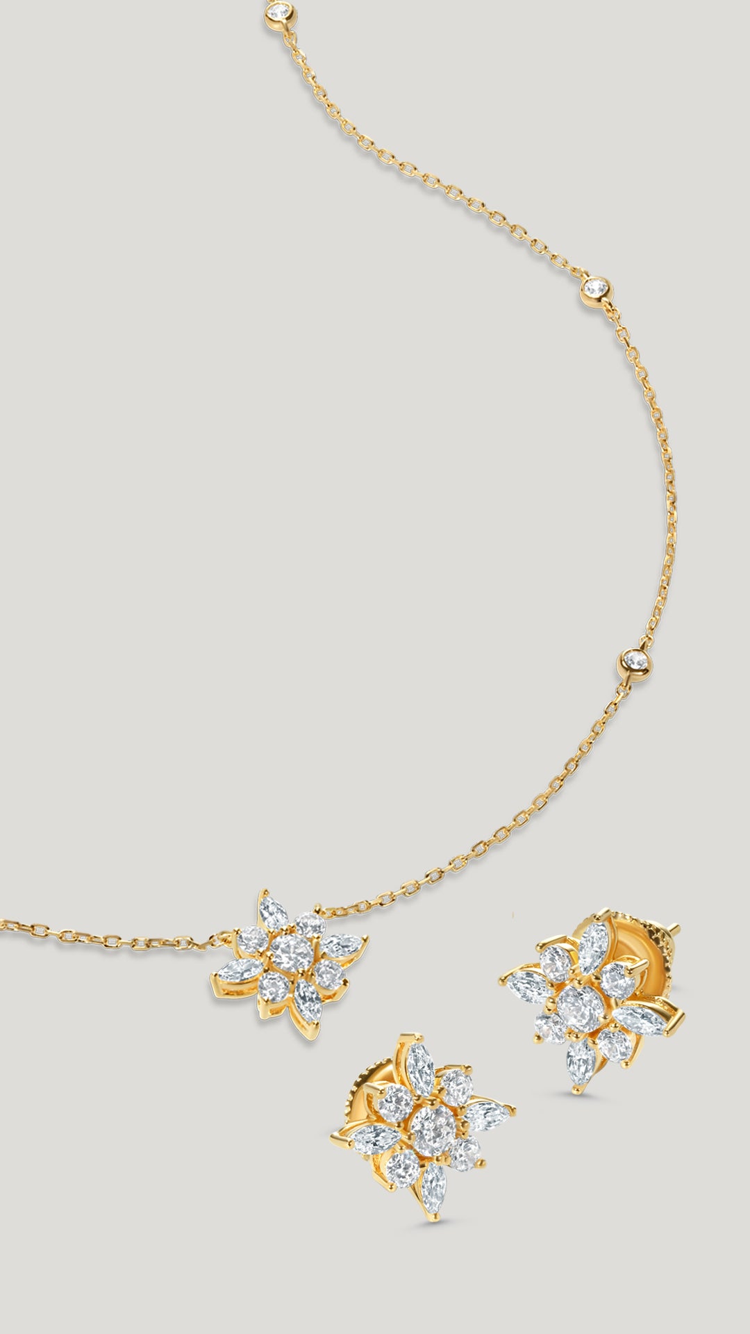 Snowflower earrings and Camelia necklace gold vermeil jewellery gift set for women.