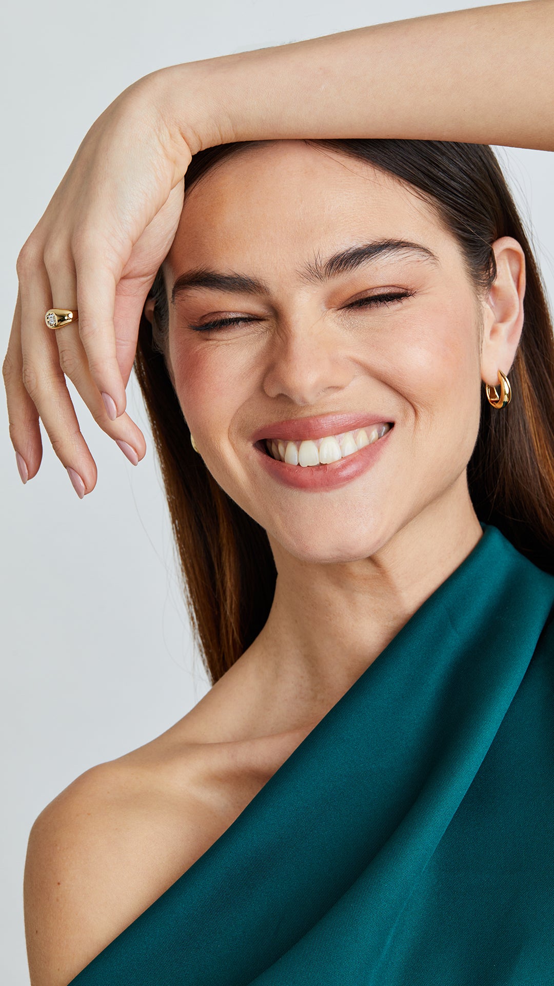 18k gold vermeil signet ring paired with gold everyday hoop earrings for women.