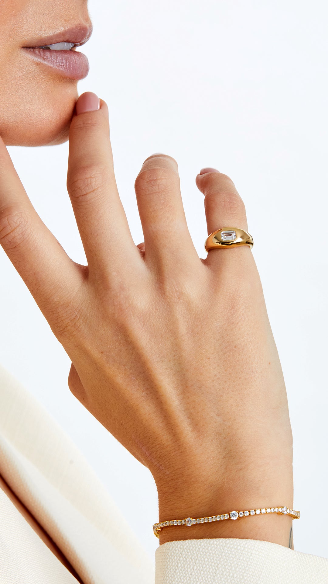 Designed for the modern minimalist, this gold vermeil signet ring with an emerald-cut gemstone is a chic accessory.