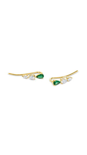 Gold ear climber earrings for women, featuring ethree well-proportioned pear-cut stones with one emerald gemstone for a touch of colour.