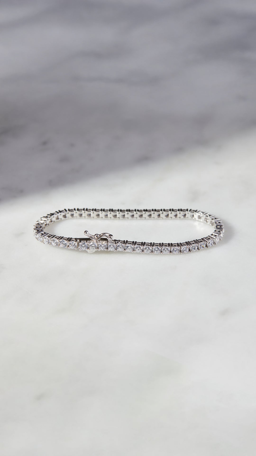 Classic and affordable sterling silver tennis bracelet, available in three wrist sizes.